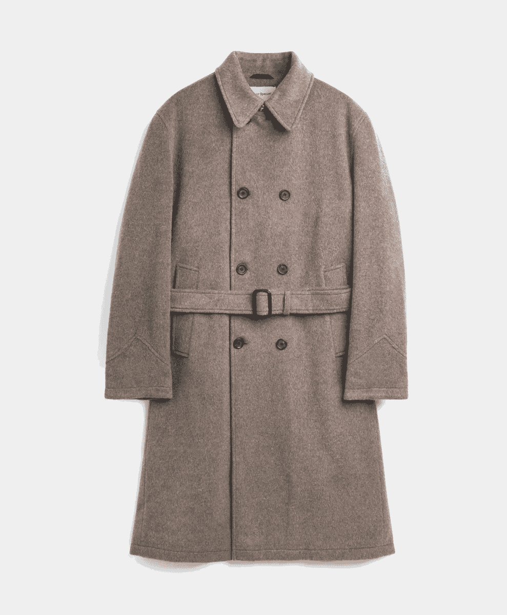 Flat lay of a taupe belted double-breasted wool coat showing the waist tie and collar.
