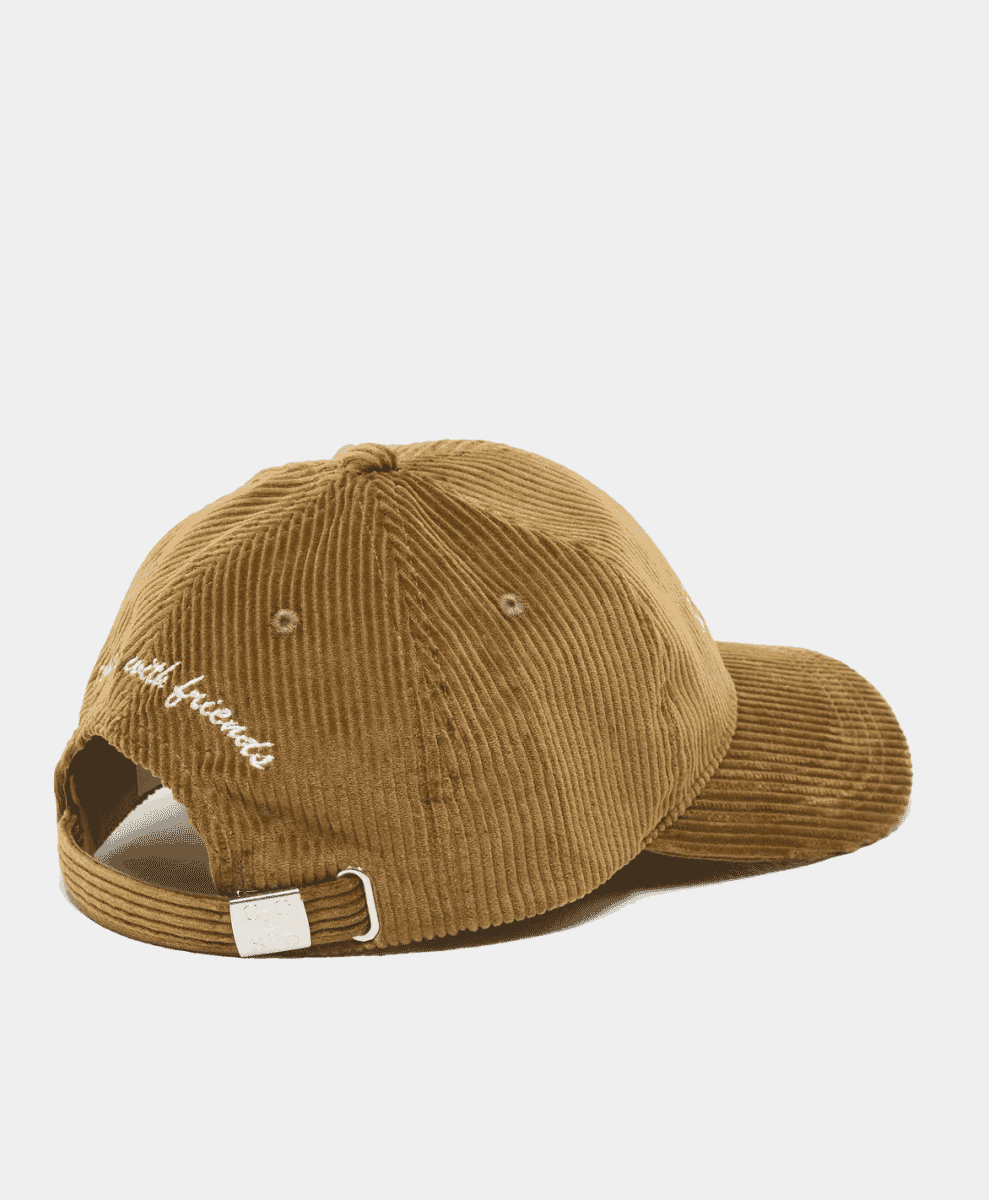 Rear view of brown corduroy cap with 'with friends' cursive embroidery.