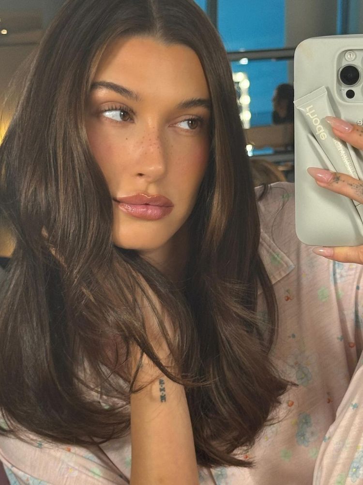 Hailey Bieber's social media debut of her viral 'Chocolate Syrup' hair color.