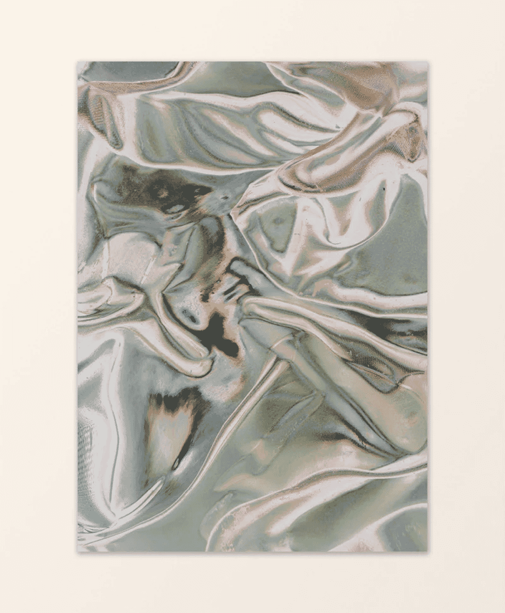 Close-up detail of metallic silver and gray fabric folds with a fluid, liquid-like texture.