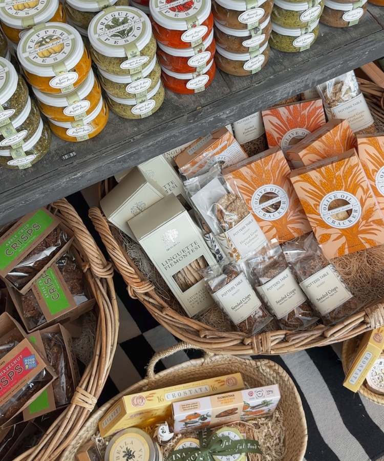 Minimalist and styled kitchen counter featuring jars of grains and various condiments.