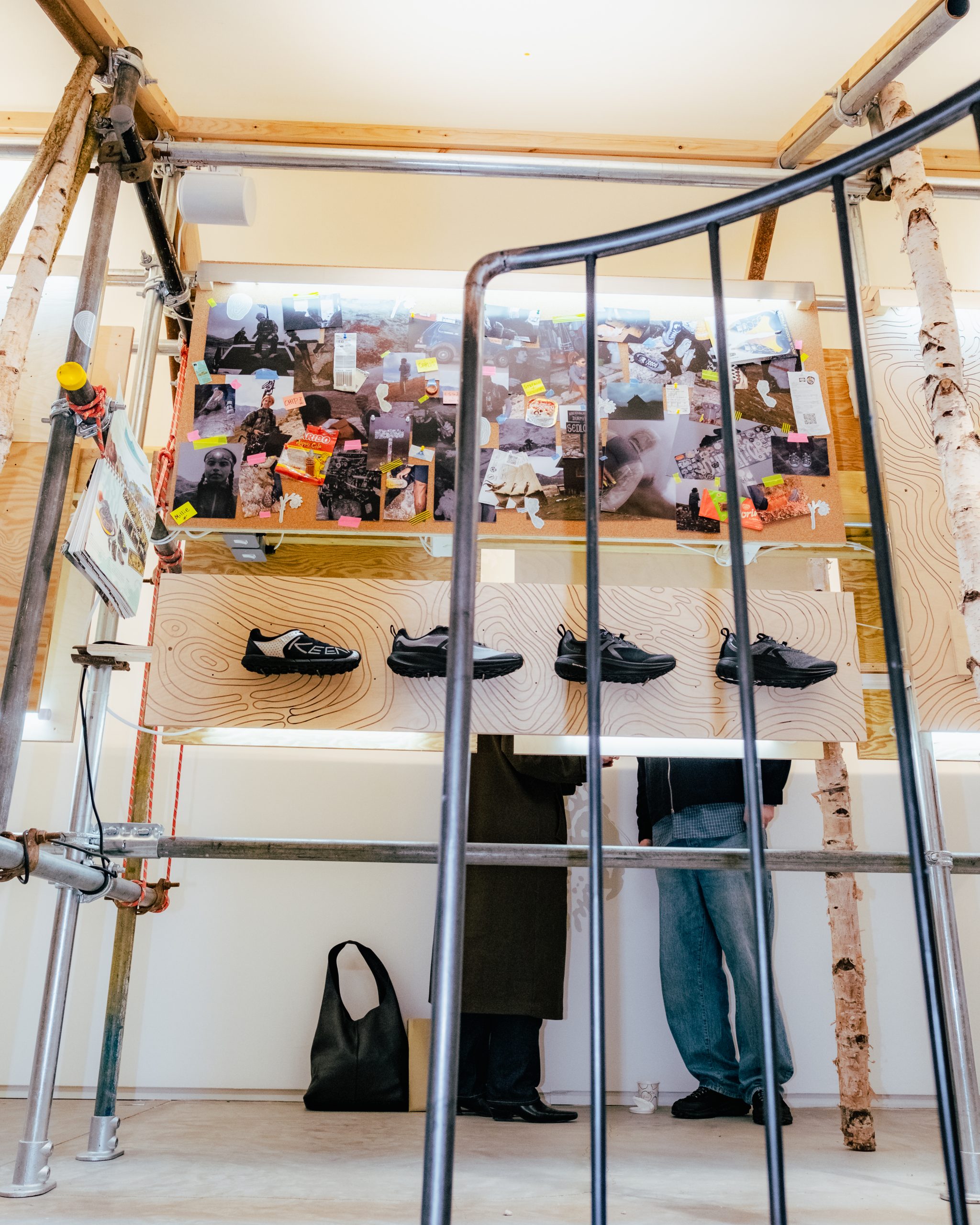 A large collection of miniature shoe keyrings in various vibrant colors showing intricate stitching.