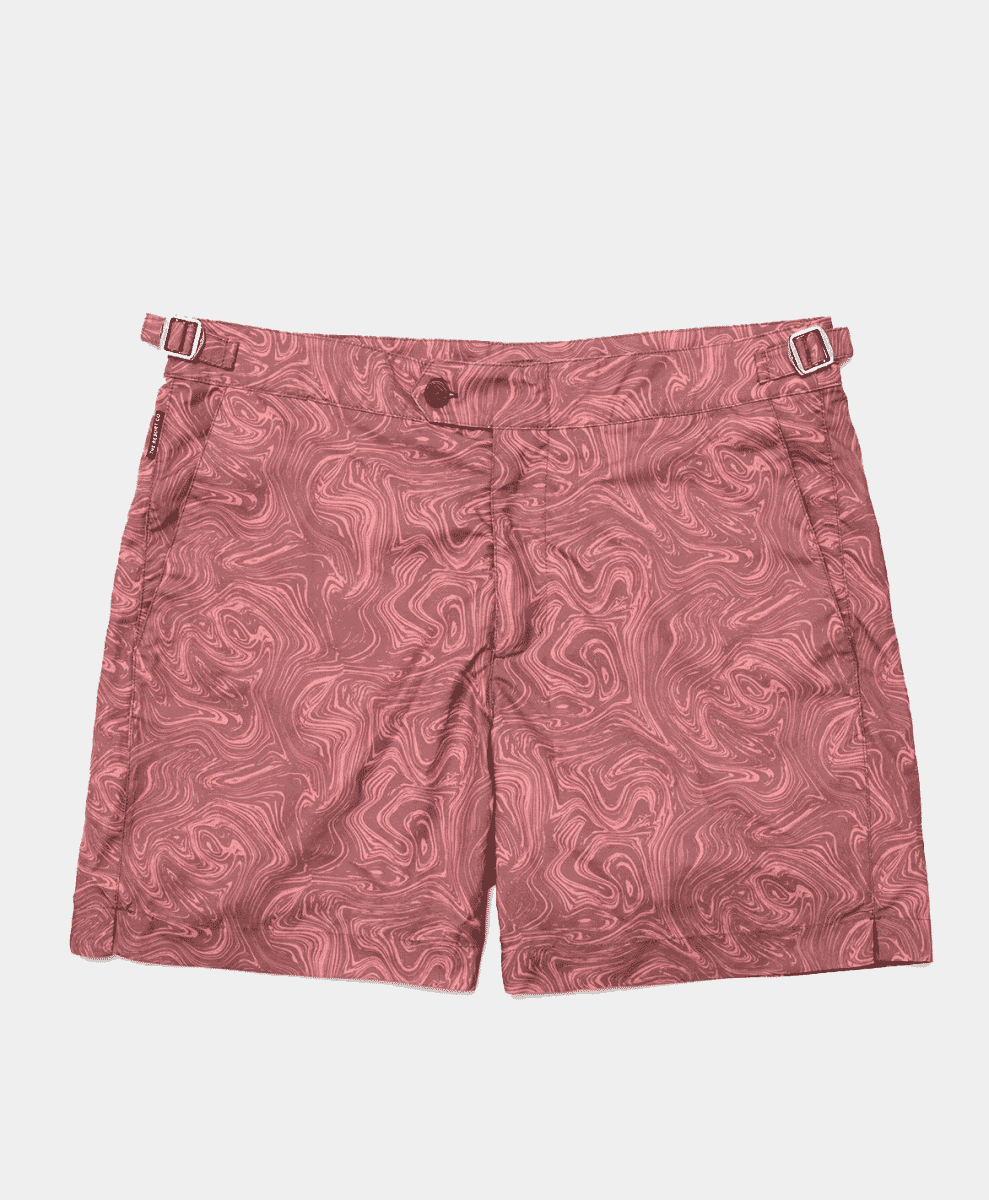 Pink marbled-patterned tailored swim shorts with double buckle waistband