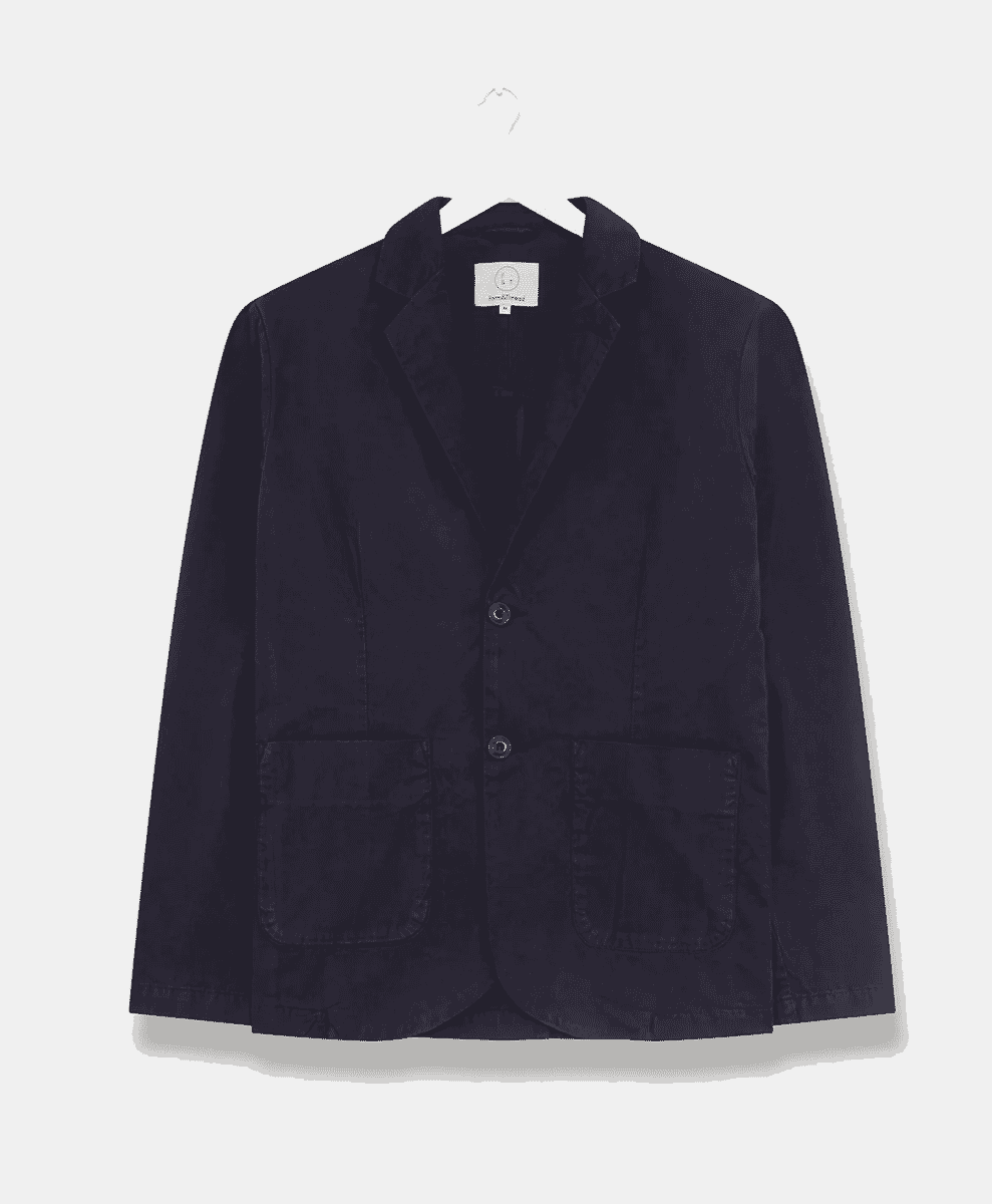 A dark navy twill blazer displayed on a wooden hanger.