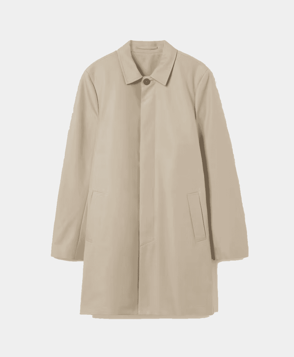 Flat-lay of a beige knee-length trench coat with a single button closure.