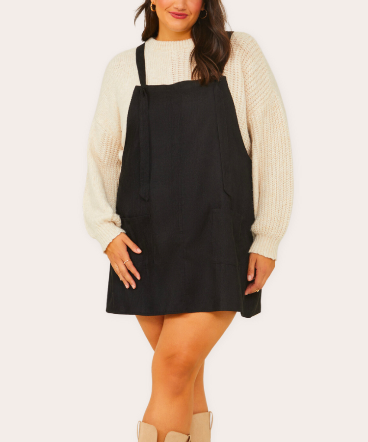 Rust-colored corduroy skirtall from Arula.