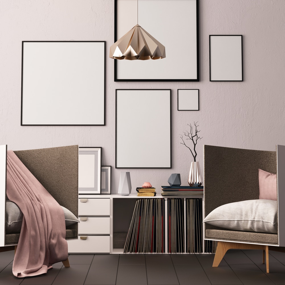 Detail shot of a geometric pendant light and record storage against a lavender wall.