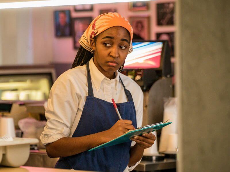 Sydney from The Bear in her chef uniform