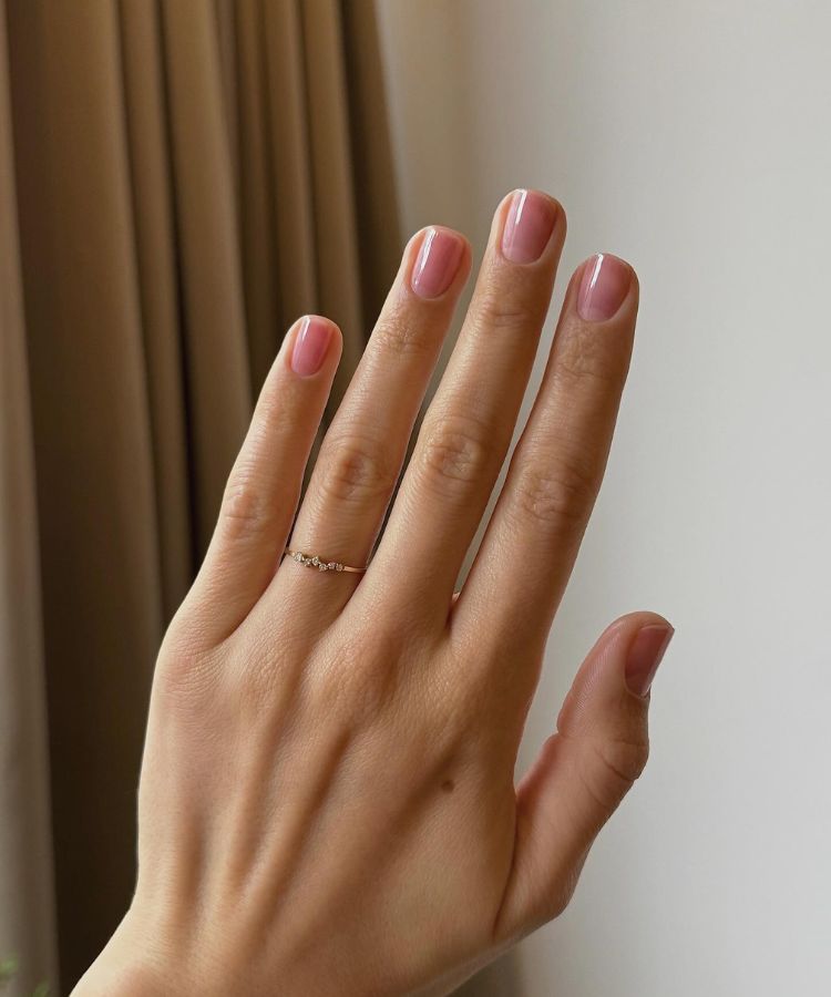 Sheer pink 'strawberry syrup' style jelly nails by @matejanova.