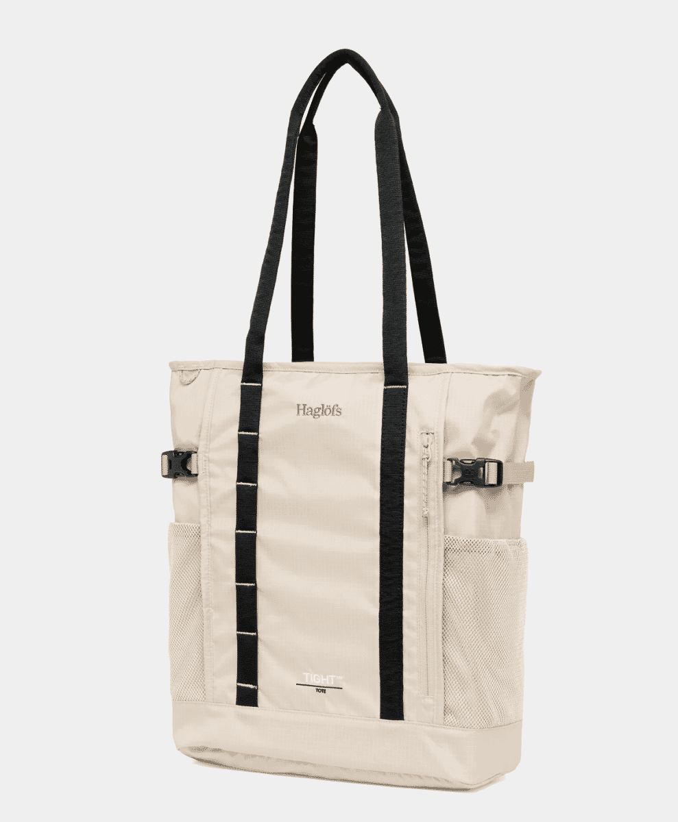 Beige Haglöfs Tight Tote bag with mesh pockets.