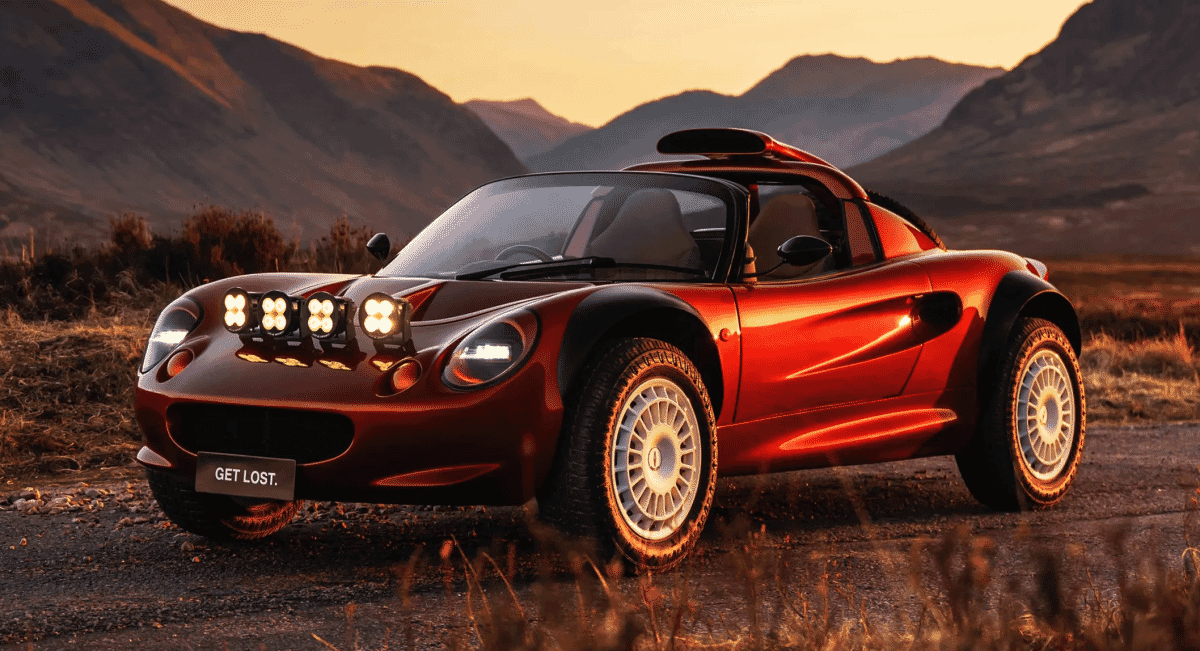 Side profile of a red off-road Lotus with 'GET LOST.' license plate during a golden hour sunset.